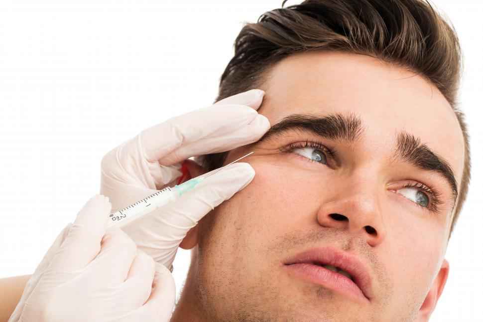 Free Image of Cosmetic surgery. Man receiving injections 