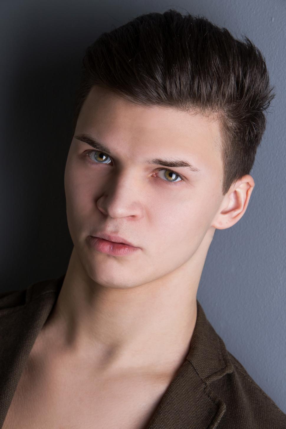 Free Image of Young man on gray background 
