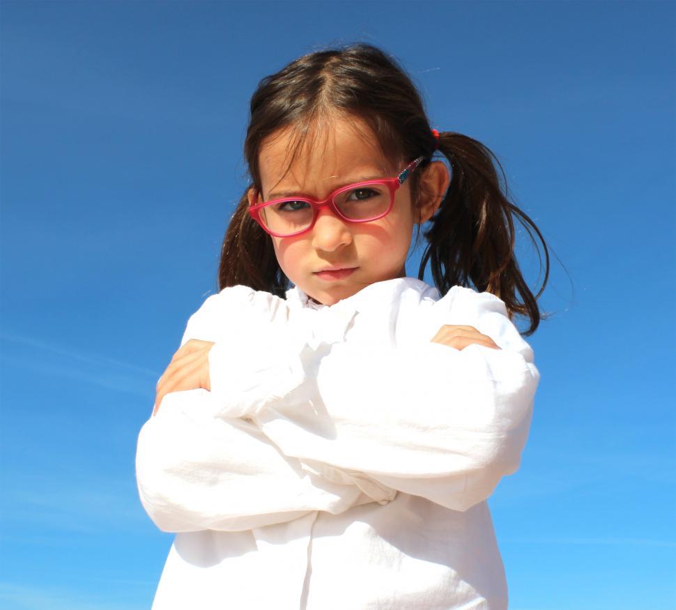 Free Image of Little Girl Sulking - Disagreement - Negative Body Language 