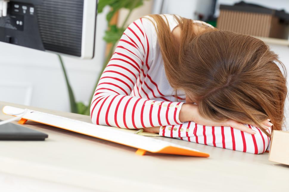 Free Image of Lifestyle. Girl sleeping at work 