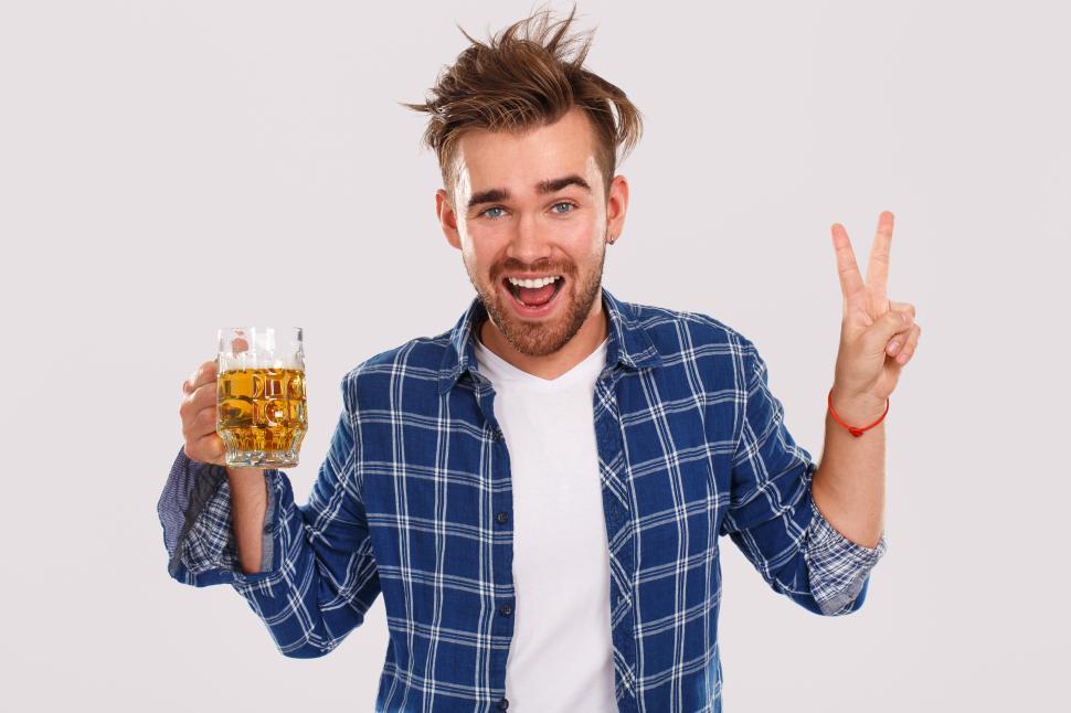 Free Image of Alcohol. Messy drunk guy holding a beer. 