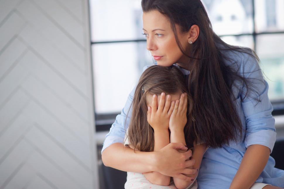 Free Image of Mother comforting her daughter 