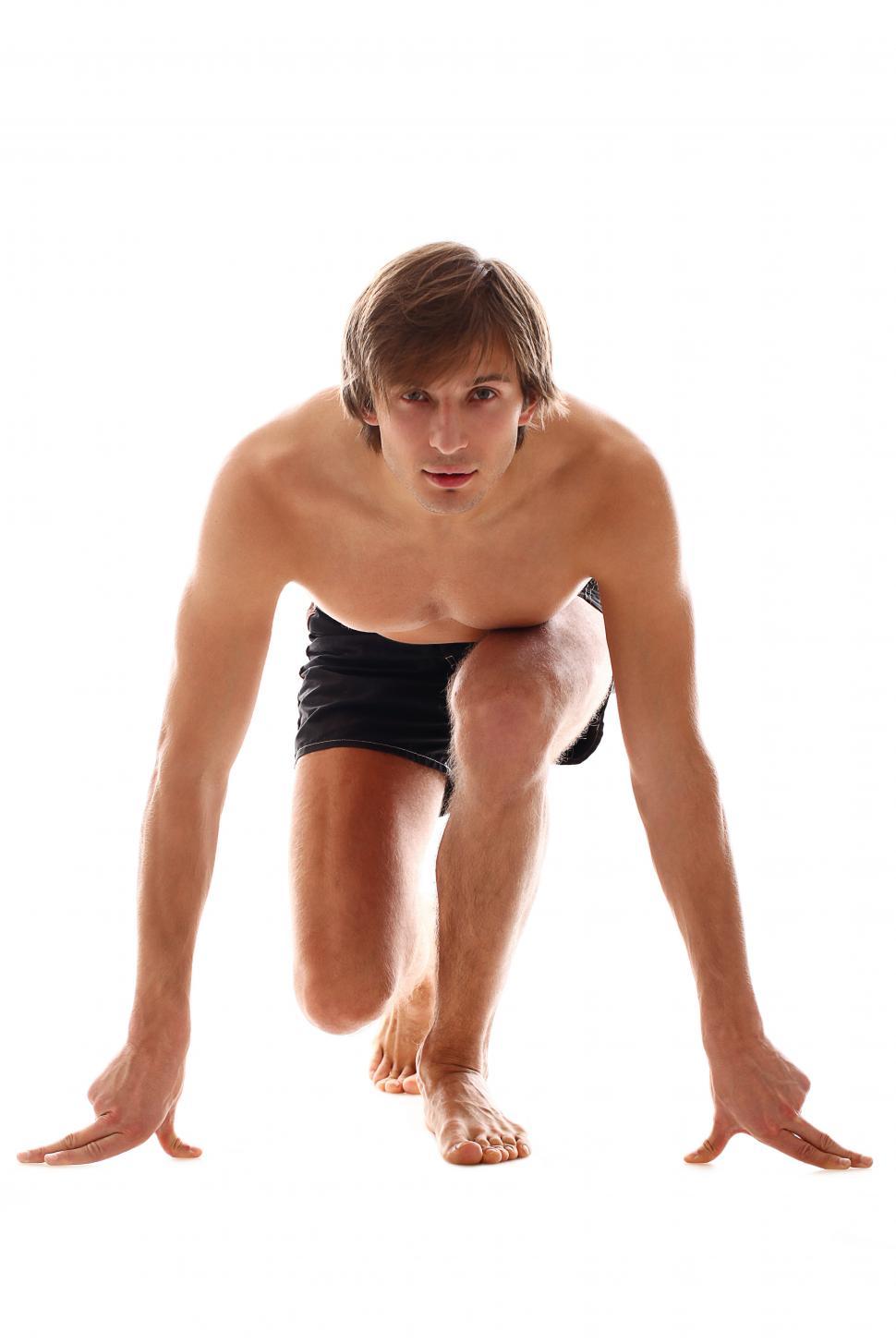 Free Image of Athletic man in starting pose 