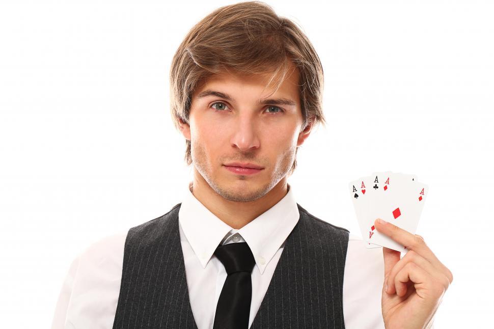 Free Image of Man with four aces in his hand 