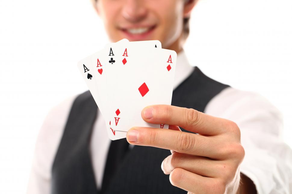 Free Image of Four aces, shown to the camera 