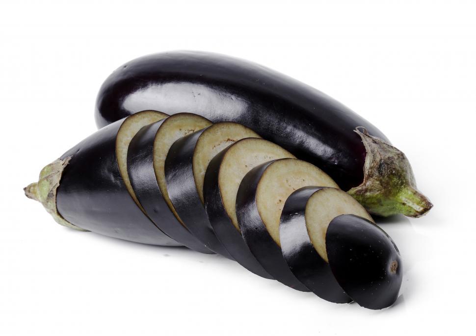 Free Image of Eggplants. One whole and one sliced. 