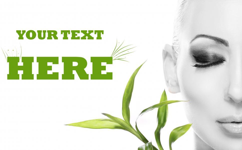 Free Image of Woman in black and white with bamboo leaves and copyspace 