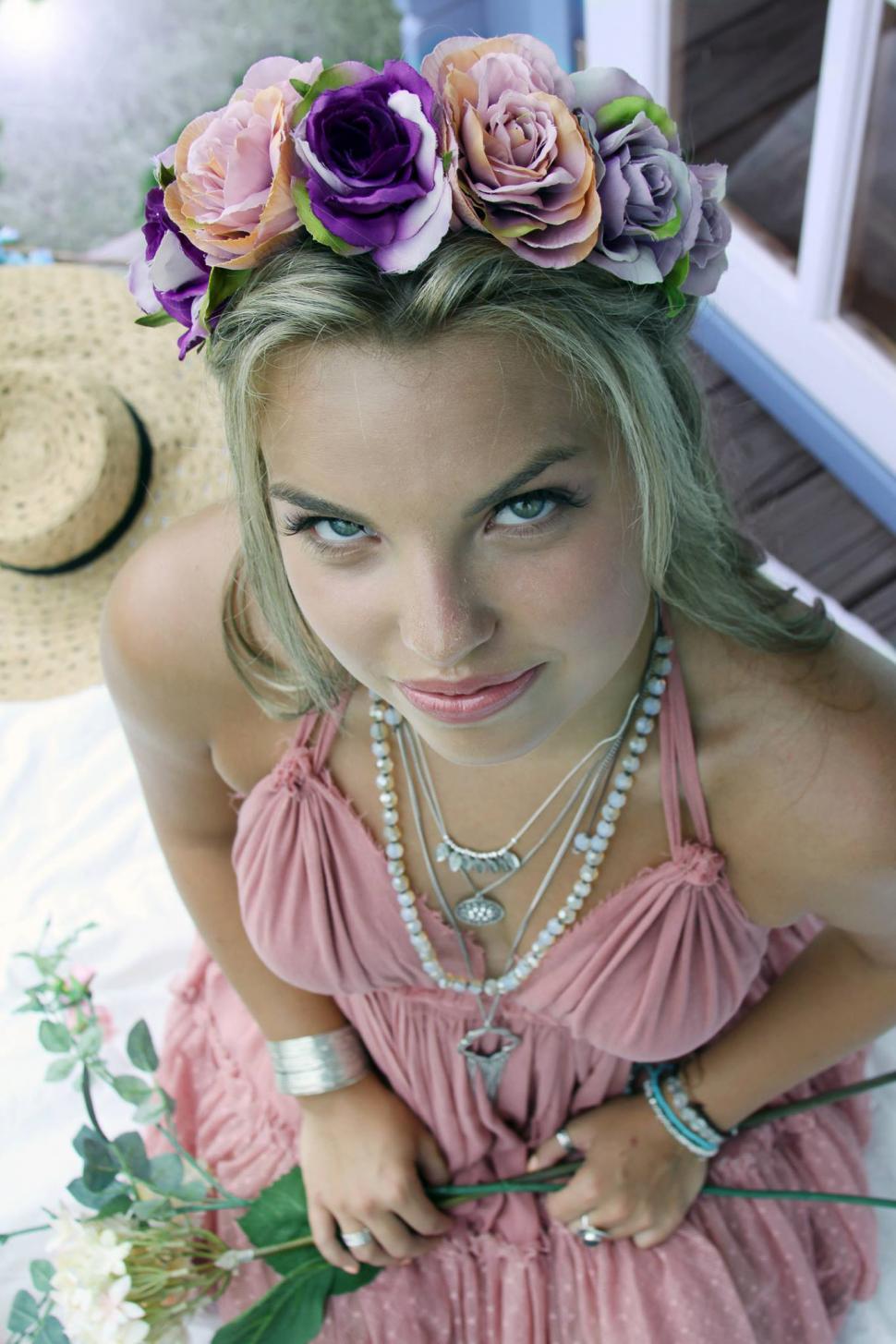 Free Image of Female fashion model with wreath, posing and looking at camera 