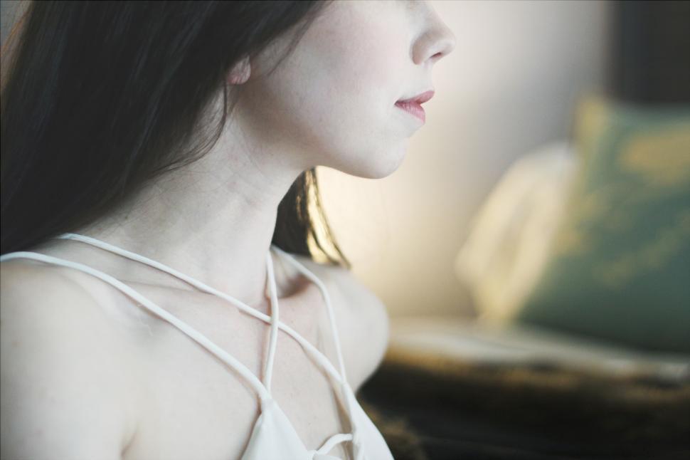 Free Image of Female fashion model face with long black hair 