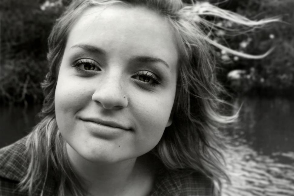 Free Image of Young smiling girl with open hair - b&W 