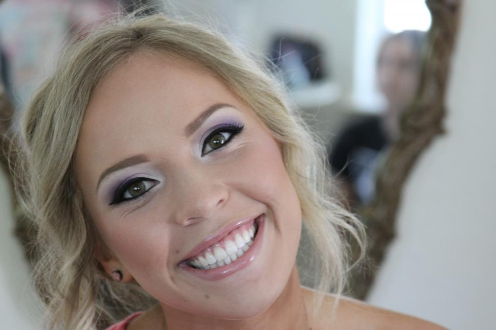 Free Image of Close up of smiling blonde woman face 