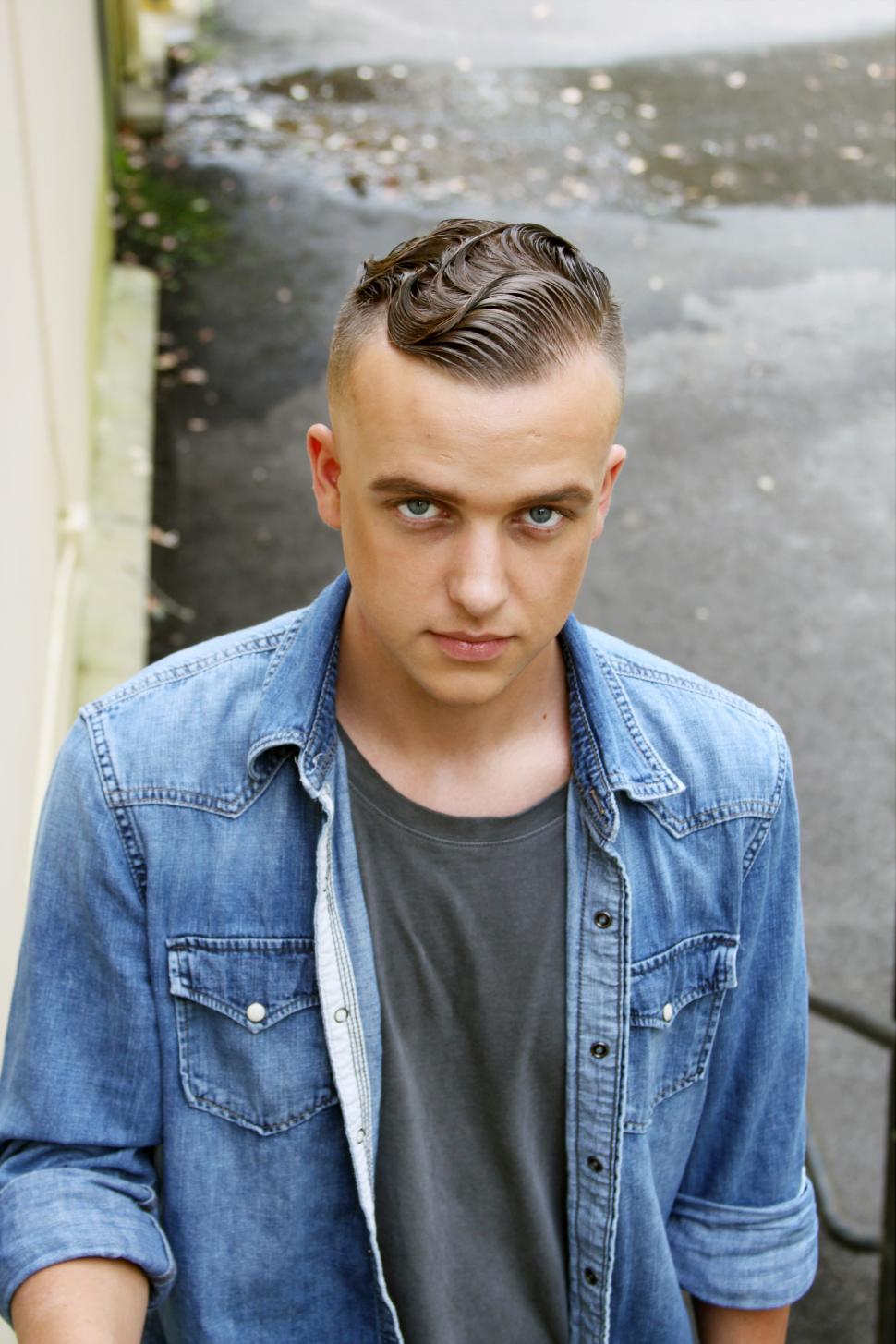Free Image of Young boy in denim shirt - looking at camera 