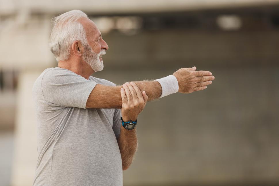 Free Image of Senior old man doing exercise in the park 