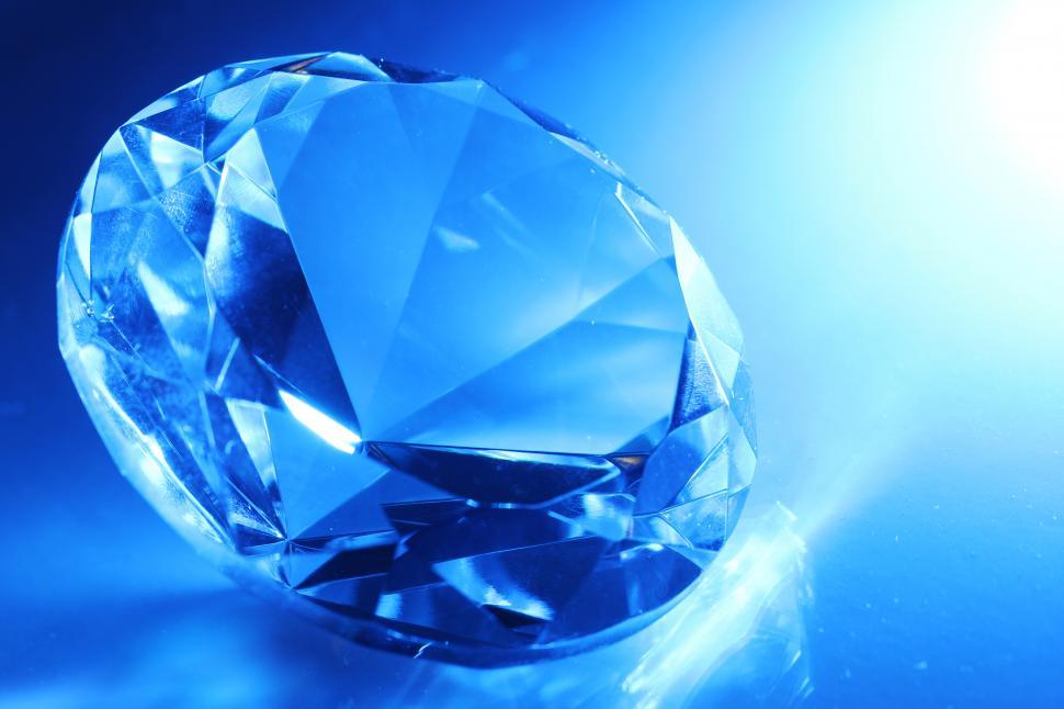 Free Image of Large faceted cut jewel in dramatic light 