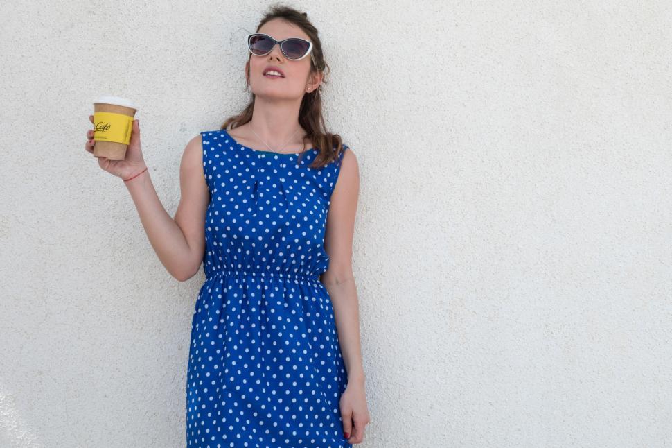Free Image of Woman posing with paper cup 