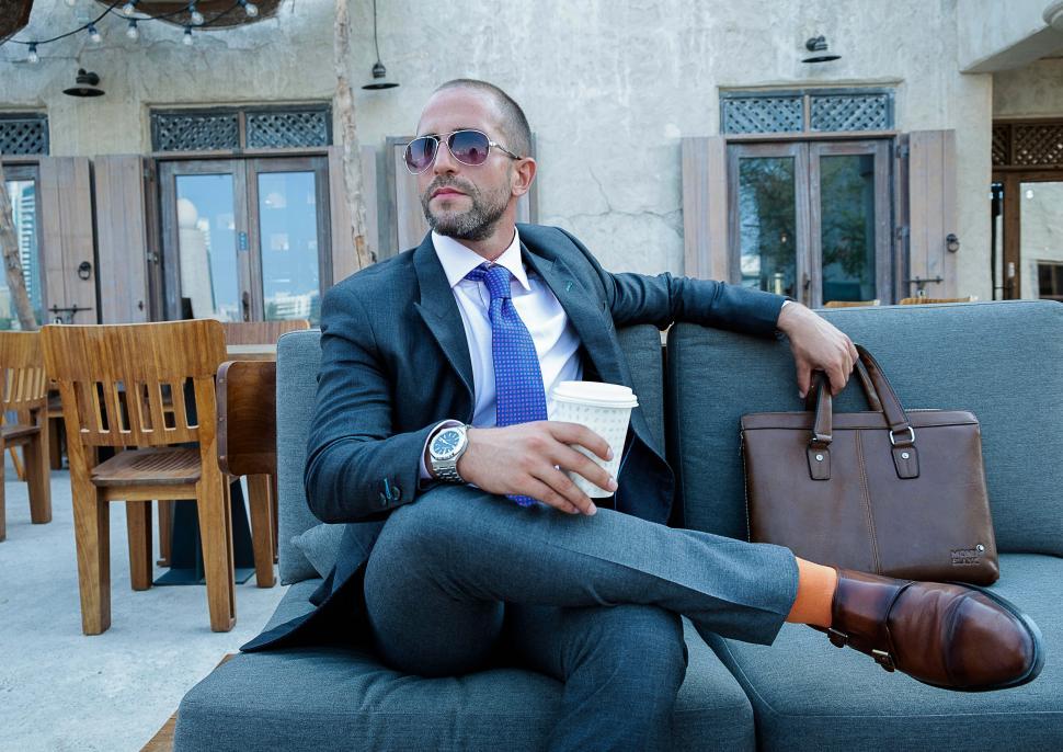 Free Image of Young man in formal clothing and laptop bag at the bar 