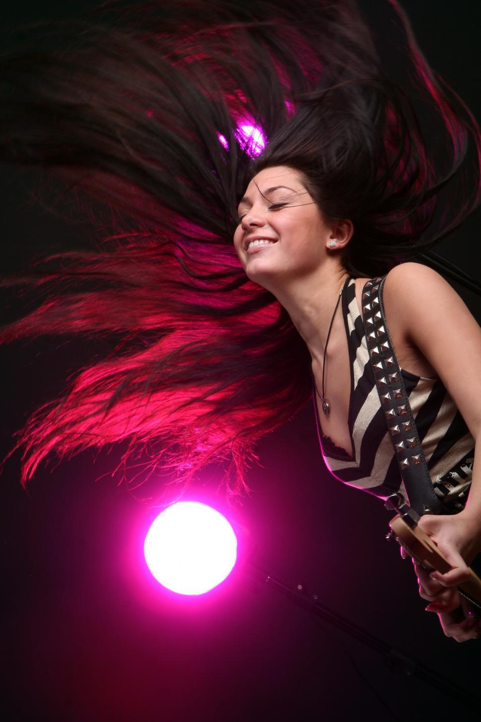 Free Image of happy smiling musician playing guitar 