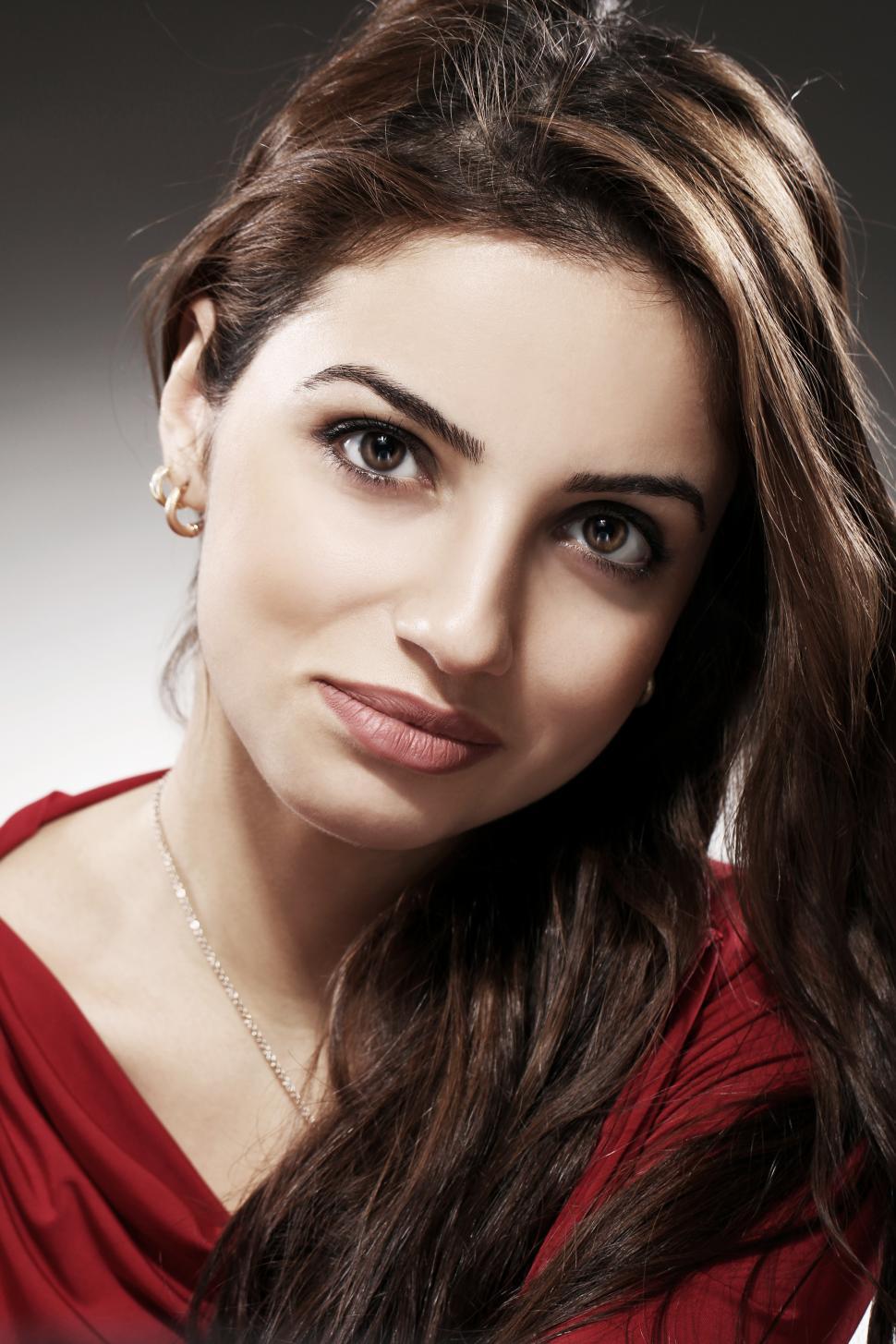 Free Image of Portrait of woman with long dark hair 