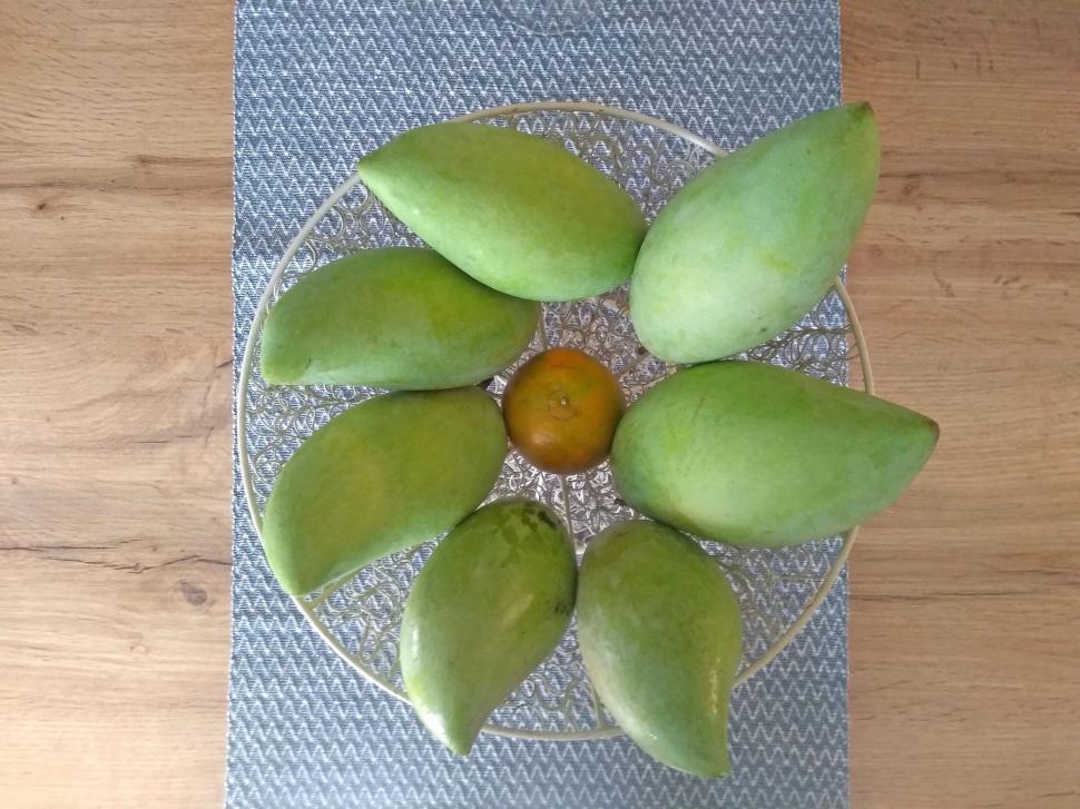 Free Image of Above view of green mangoes  