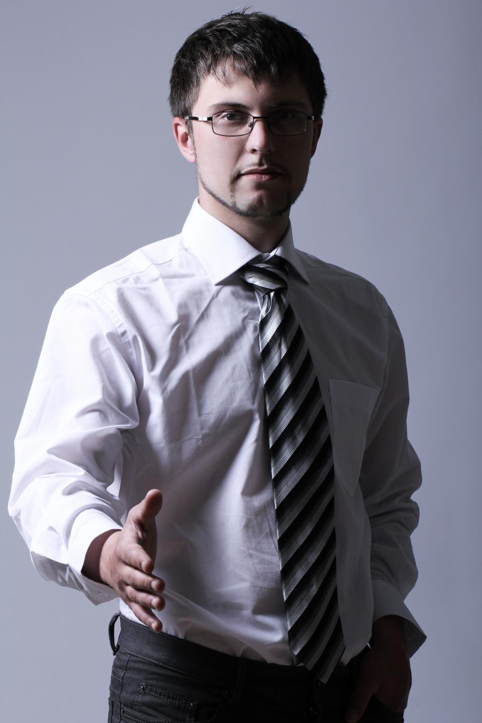 Free Image of Businessman offering his hand for handshake 
