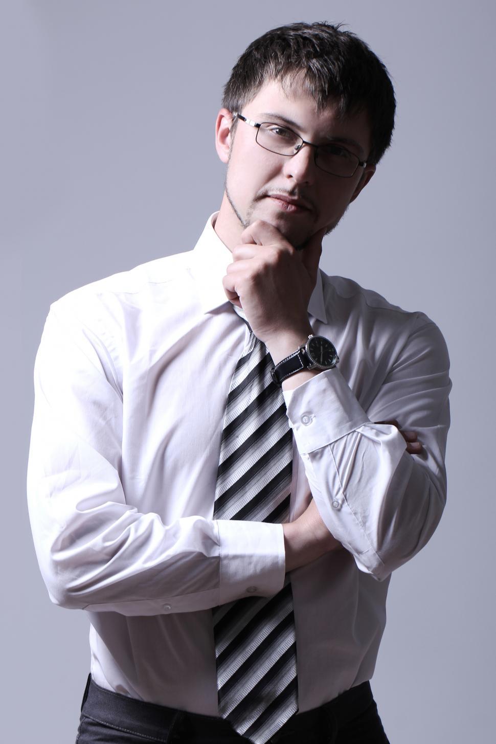 Free Image of Portrait of young contemplative businessman 