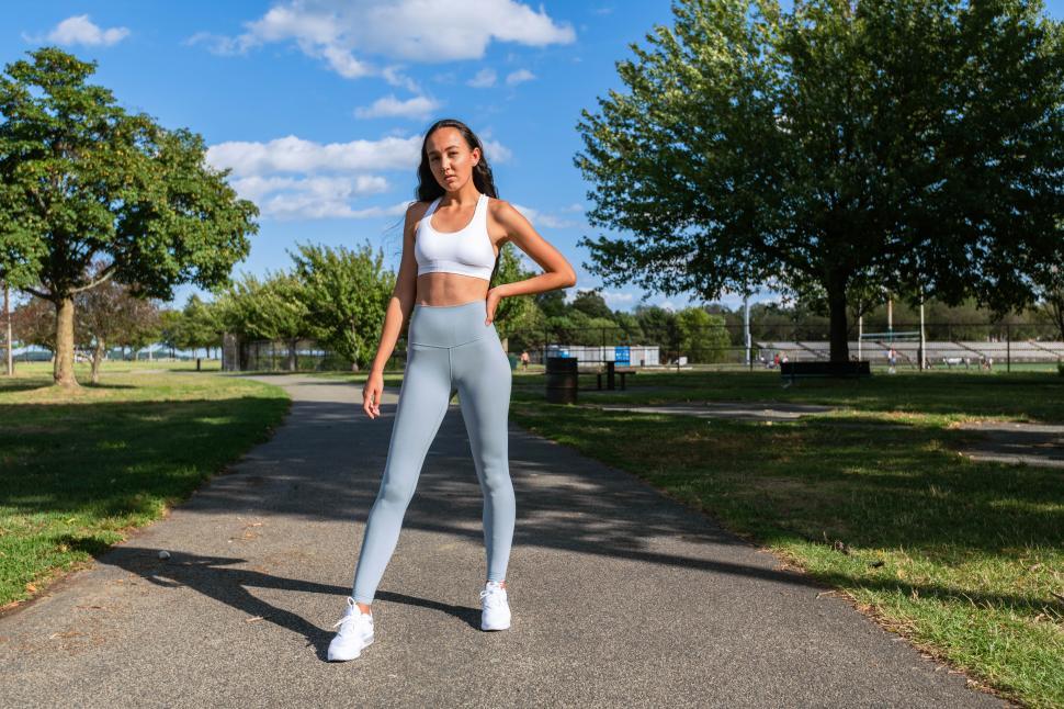 Free Image of Woman athlete standing on the track 