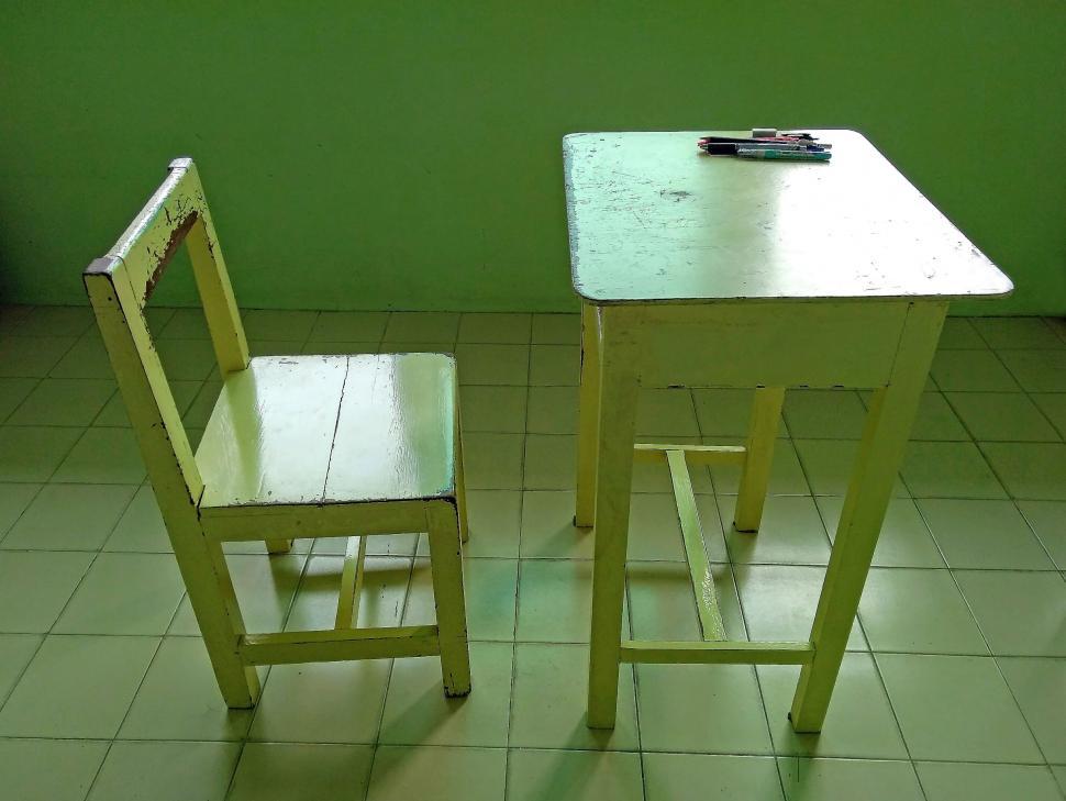 Free Image of Vintage wooden school desk and chair  