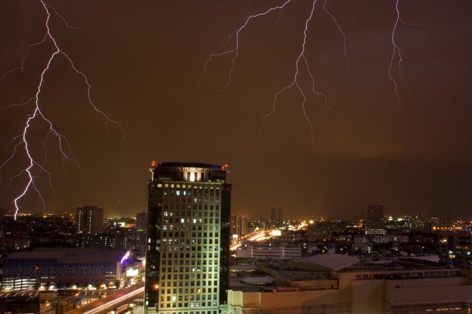 Free Image of Massive Building Amidst Intense Lightning Storm 