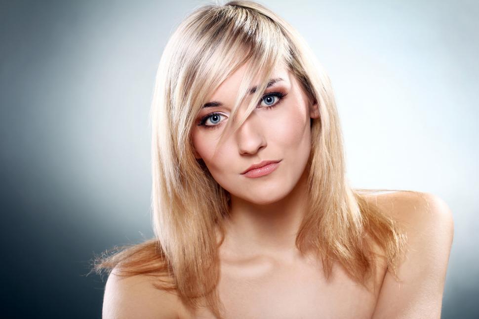 Free Image of Young woman looking serious, facing camera 