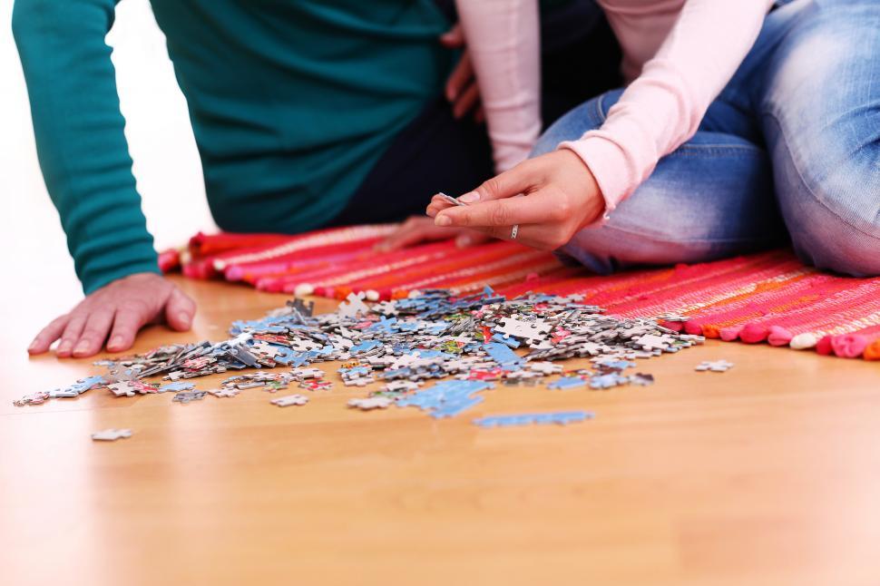Free Image of Working on a jigsaw puzzle 
