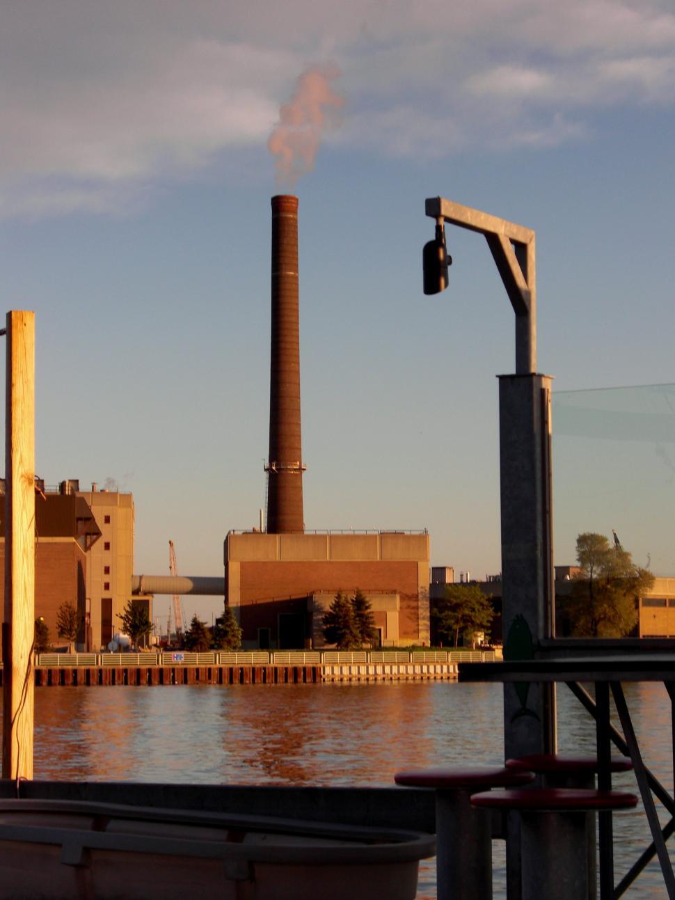 Free Image of Industrial Factory Emitting Smoke From Stacks 