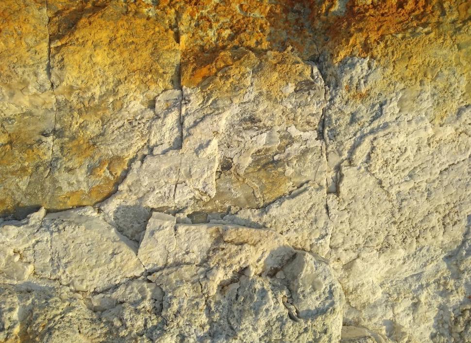 Free Image of Orange and white colored rock texture 