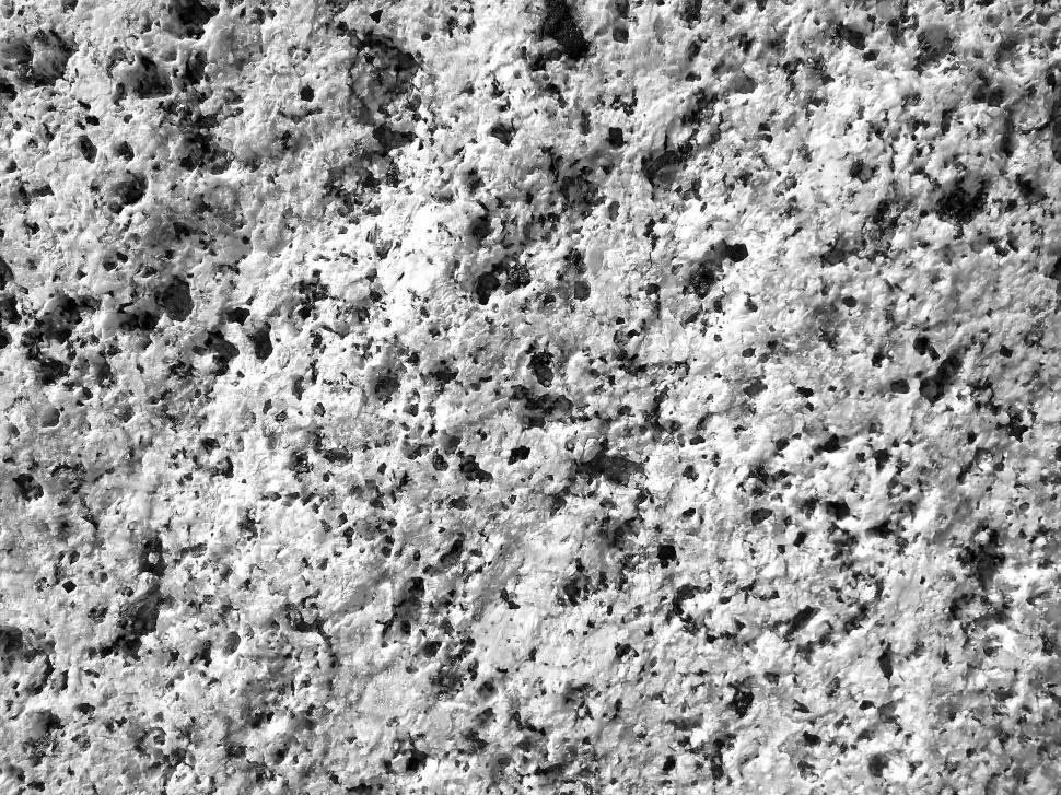 Free Image of Speckled black and white rock texture background  