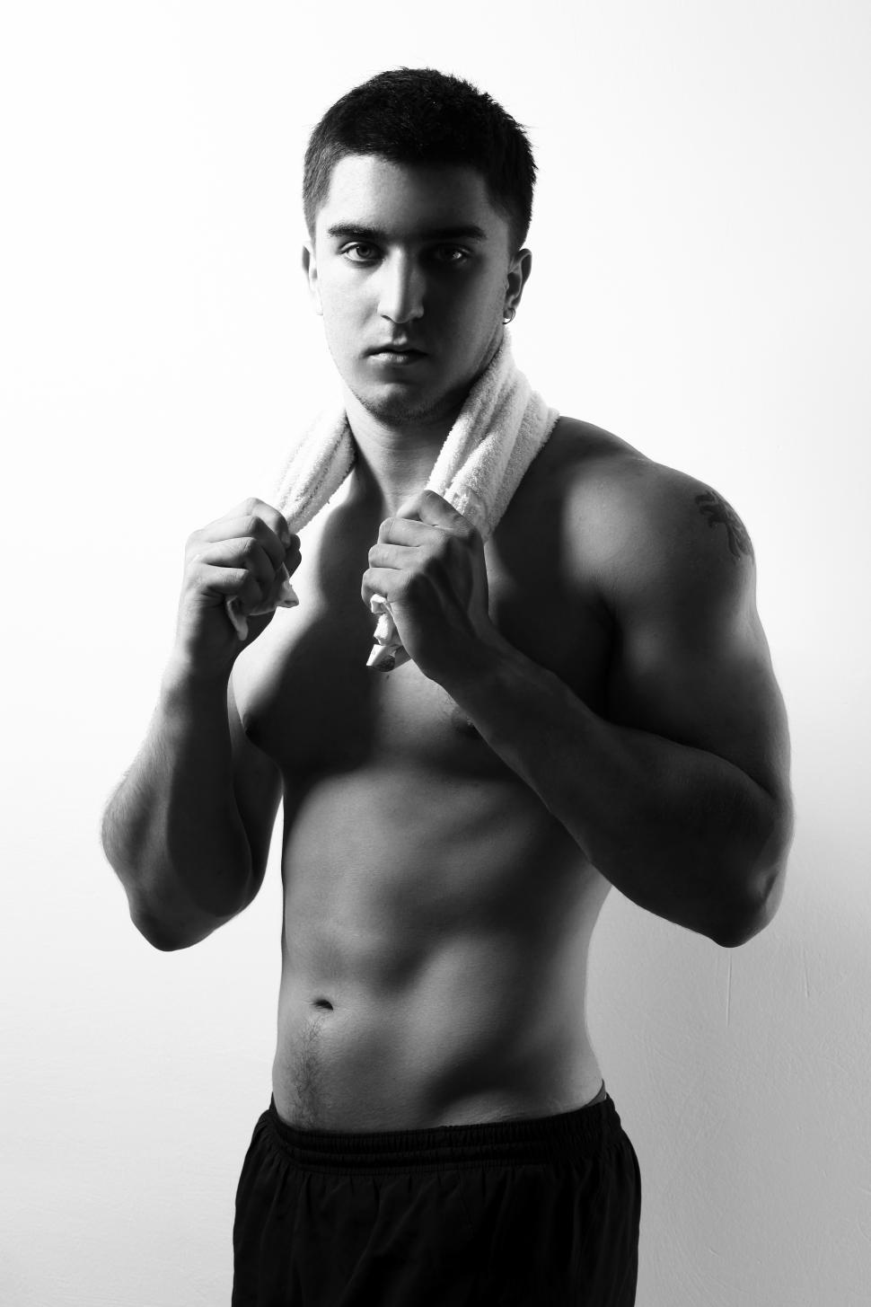 Free Image of Young and muscular guy with towel, black and white 