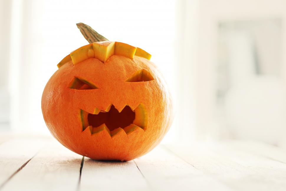 Free Image of Carved pumpkin with scary face 