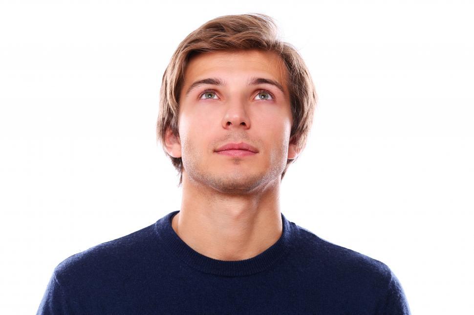 Free Image of Headshot of a man looking up 