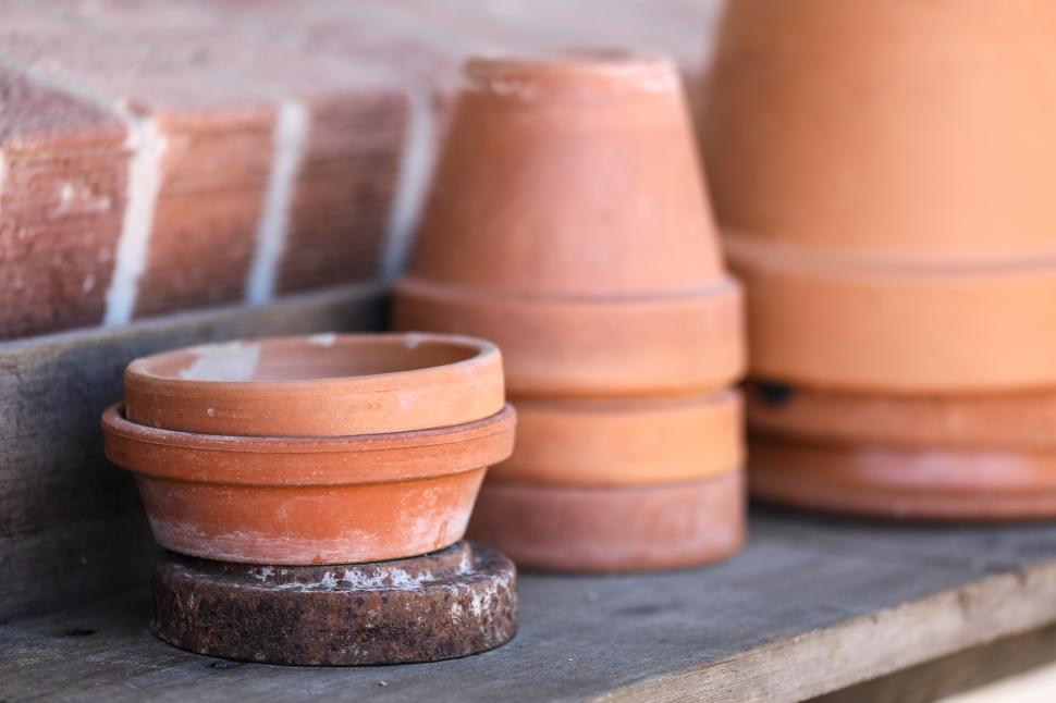 Free Image of Terra Cotta pots on a shelf 