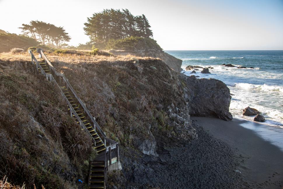 Free Image of Long wooden stairs down to the beach 
