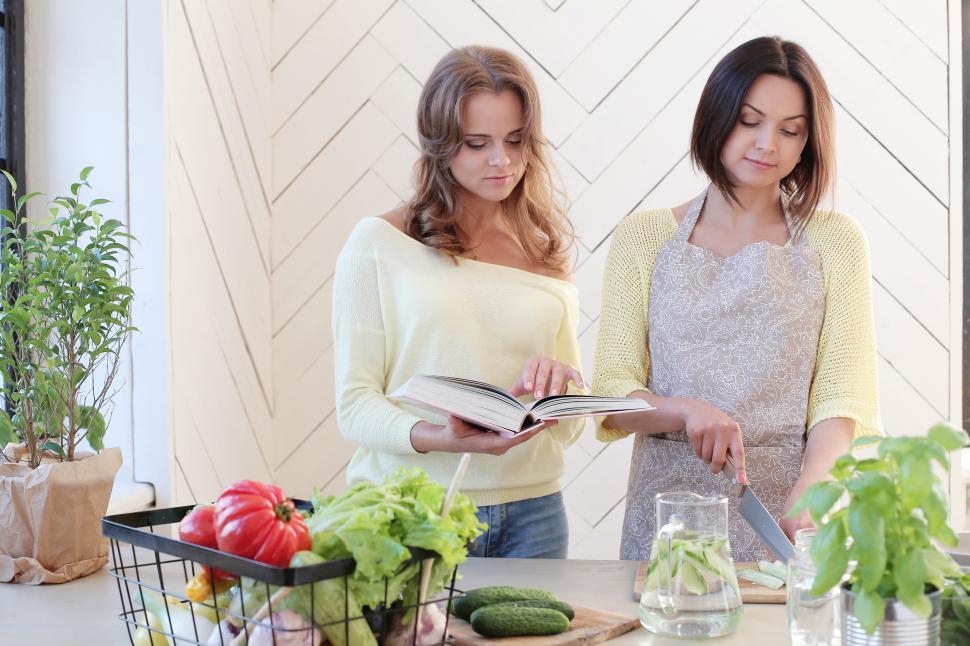 Free Image of Two best friends cooking 