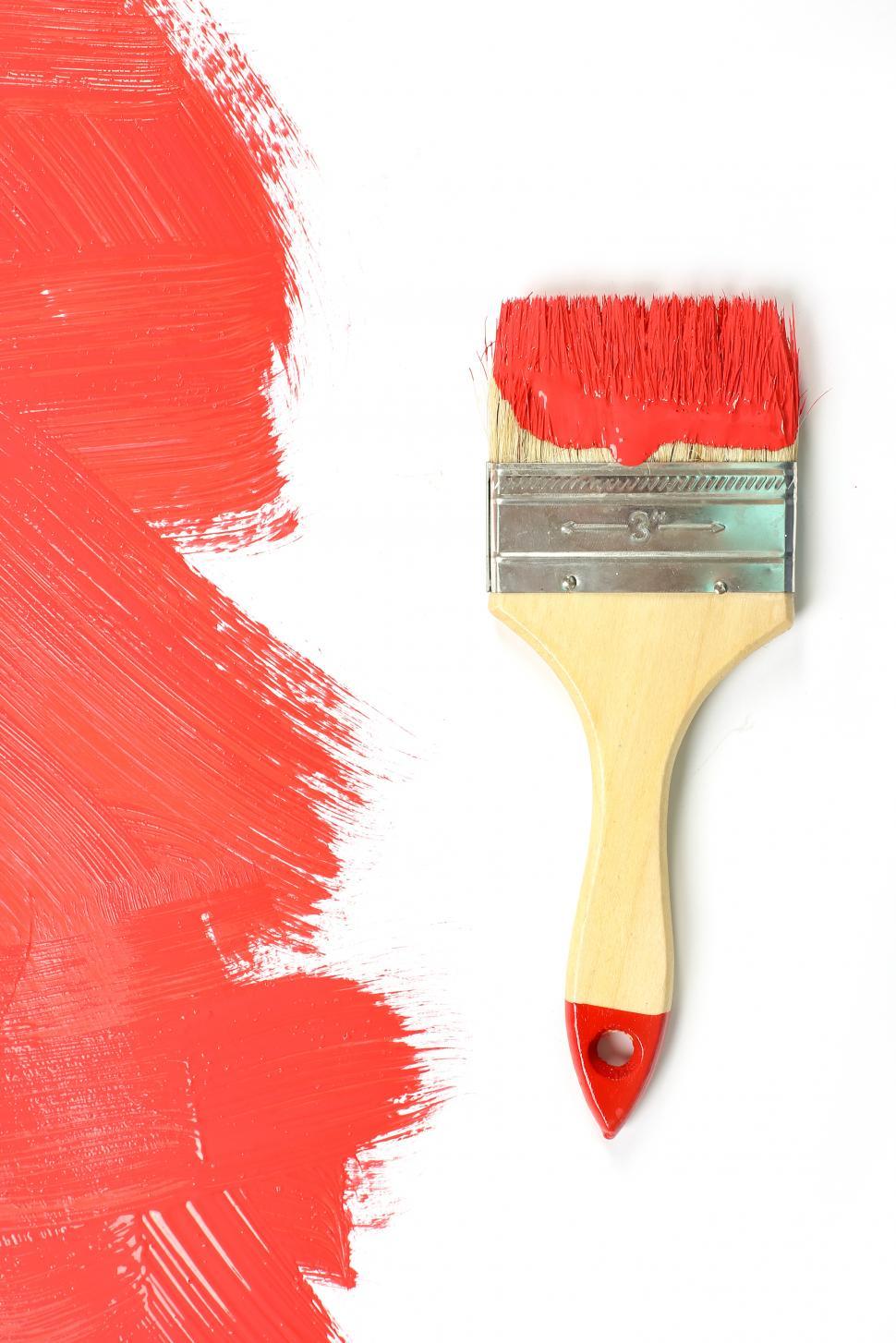 Free Image of Red Paint on wide paintbrush 