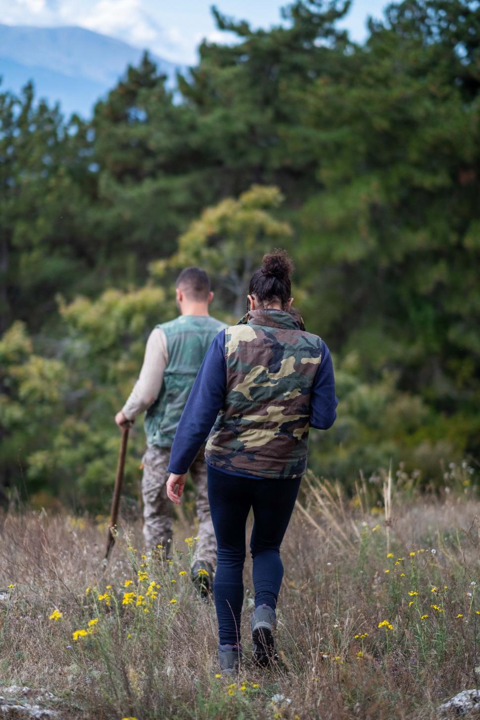 Free Image of Couple hiking in the forest 