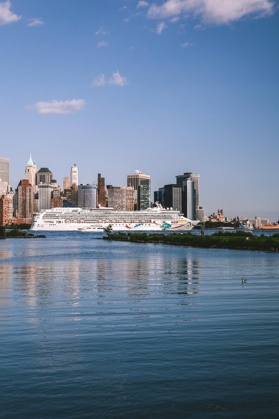 Free Image of Skyscrapers with Ship in sea 