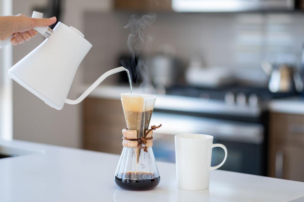 Free Image of Hand and Paper Filter Coffee 