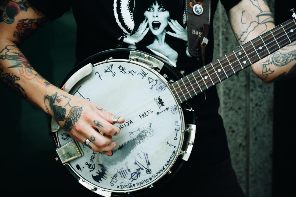 Free Image of Hands and Banjo guitar 