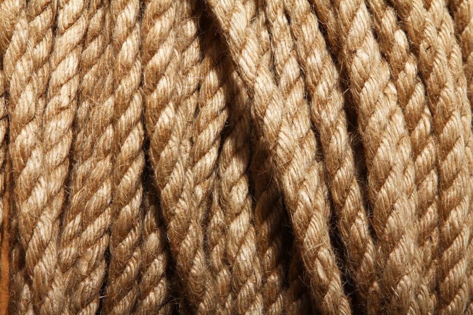 Free Image of Close up of a spool of aged rope 