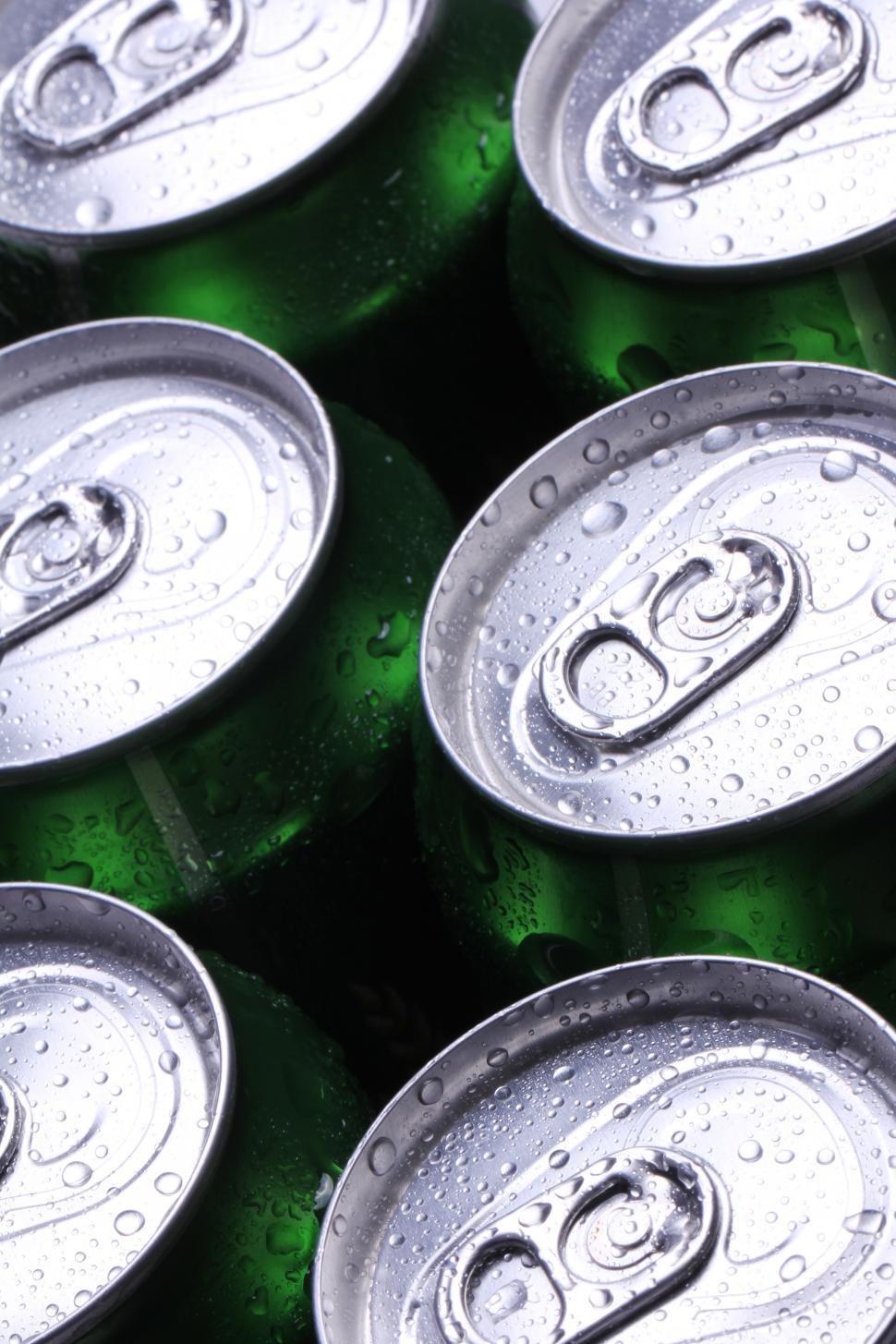 Free Image of Tops of aluminum cans filled with cold drink 