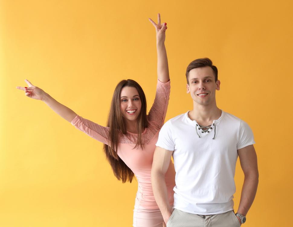 Free Image of Happy young couple looking at camera 