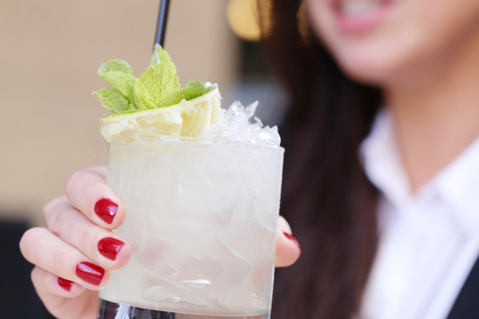 Free Image of Woman with a cocktail 