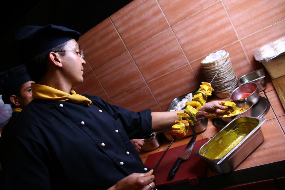 Free Image of professional chef making skewers  