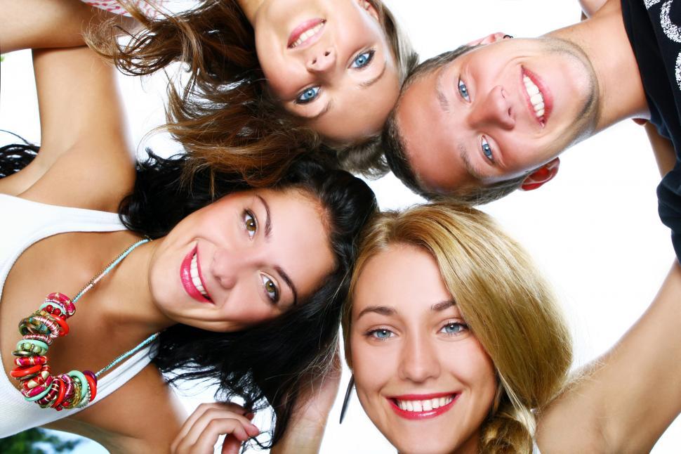 Free Image of Group of friends with heads together 